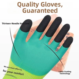 Detail of 13-gauge knit protective work gloves with textured black latex palm coating