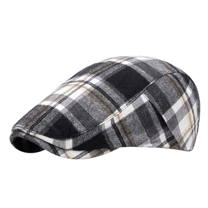 Classic black and white plaid flat cap for men and women with vintage tweed texture