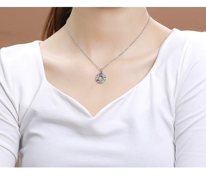 Close-up of 925 sterling silver necklace with a circular multi-color gemstone pendant