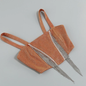 Detail of glitter camisole top with shimmering silver tassels and bronze metallic finish