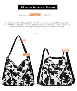 Detail showing cow print backpack with side zippers and multi-way shoulder straps