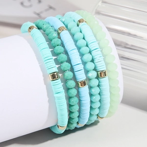Bohemian style 6-piece multi-layered heishi bead and crystal bracelet set in mint blue tones