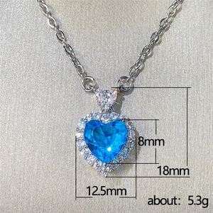 Macro view of blue heart sapphire necklace pendant with precise size and weight measurements