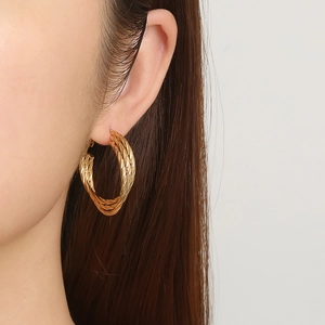 Chic 18K gold plated multi-layer twisted rope hoop earrings for women shown on model