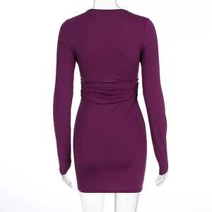 Detailed back view of deep purple bodycon mini dress featuring ruched design and slim fit