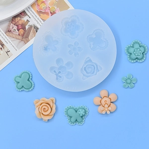 Round silicone mold with floral and butterfly patterns for DIY cake and resin crafting