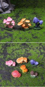 Close-up of assorted resin miniature mushrooms with green moss bases for fairy gardens