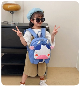 Mochila infantil de vaca para niños (2-7 años), bolso escolar azul en modelo