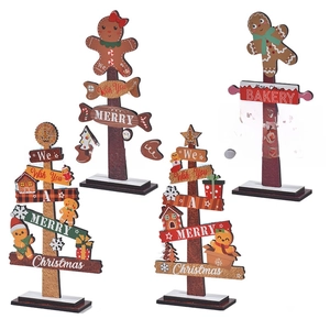 Wooden Christmas tabletop decor featuring festive signs, trees and gingerbread man designs