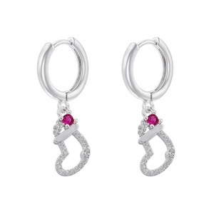 Close-up of silver Christmas stocking earrings with red stone and sparkling zircons