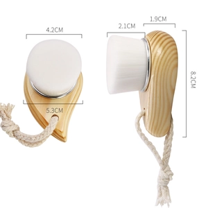 Manual wooden face brush with soft white bristles and cotton lanyard for hanging
