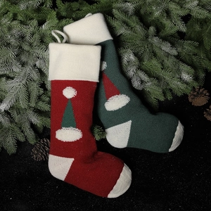 Knitted Christmas stocking gift bag set in red and green with festive 3D Santa hat patterns