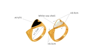 Detail view of 18K gold-plated double heart rings with acrylic and white shell inlay