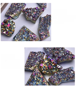 Detailed view of iridescent titanium coated rainbow crystal cluster with raw druzy texture
