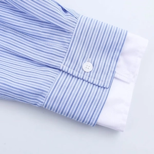 Women's blue and white striped poplin shirt featuring detailed cotton cuff and button