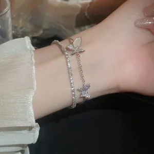 Elegant double-layered silver butterfly bracelet with sparkling zircon and tennis chain detail