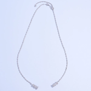 Macro detail of S925 sterling silver chain with crystal cylinders and lobster clasp