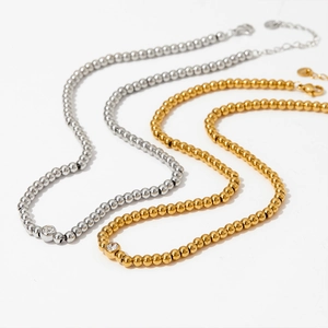 Elegant gold and silver beaded necklaces with circular crystal pendants for women