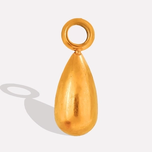 Close-up of polished gold teardrop pendant showing smooth metallic finish for DIY jewelry