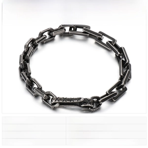 Macro detail of industrial vintage stainless steel chain bracelet with rectangular links