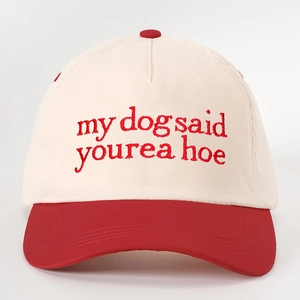 Vintage embroidery baseball cap in cream and red featuring my dog said yourea hoe text