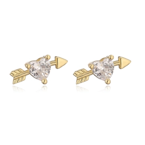 Close-up of golden Cupid's arrow stud earrings with heart-shaped sparkling zircon
