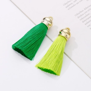 Green and yellow tassels with gold stainless steel caps for bags and keychains
