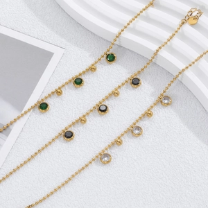 Bracelets à billes dorées avec zircons ronds en vert émeraude, noir et cristaux clairs