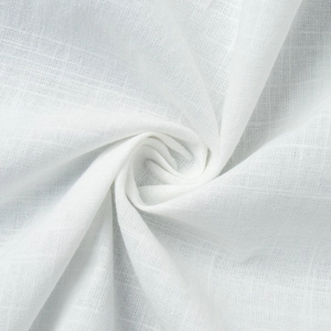 Close-up of white woven linen fabric showing delicate texture and soft spiral folds