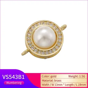 Vintage round brass jewelry connector with inset pearl and rhinestones for DIY crafts