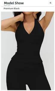 Front view of black V-neck halter yoga top with cross-wrap design and slim fit cut