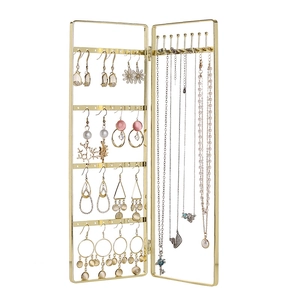 Golden iron jewelry stand for earrings and necklaces with a folding screen design