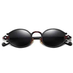 Retro steampunk oval sunglasses with gothic镂空 cross and red accents on black frame