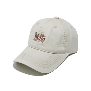 Close-up of cream baseball cap with dark brown hello cursive embroidery and fine twill fabric