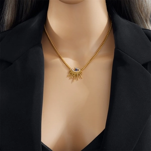 Irregular sun evil blue eye pendant necklace in gold titanium steel on model