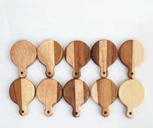 Detail showing 10-piece mini wooden bottle openers with natural wood grain and handle