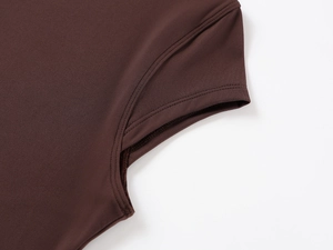 Close-up of the stitching on the shoulder and cuff of a brown high-elasticity t-shirt