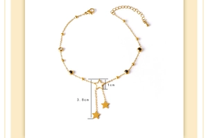 Detail view of gold star tassel anklet with dimension markers showing 1cm and 3.8cm
