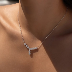 Elegant S925 sterling silver Y-shaped floral necklace with sparkling stones on model