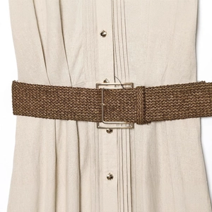 Slim fit beige linen dress featuring a woven brown belt with a square gold metal buckle