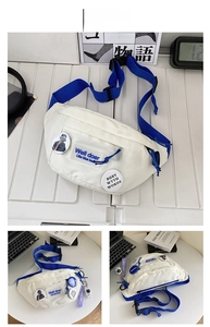 Detail view of white canvas chest bag with blue straps and stylish space travel badges