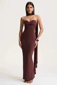 Detail of chocolate brown bodycon maxi dress featuring chic neck tie and twist chest design