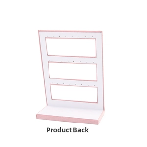 Rear view of L-shaped pink velvet earring display stand showing layered storage structure