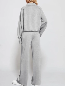 Rear view of a grey two-piece set featuring raglan sleeve sweatshirt and wide-leg trousers