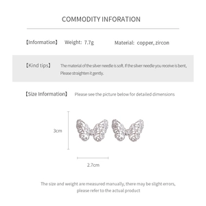 Detailed view of silver butterfly stud earrings with dimensions and material specs