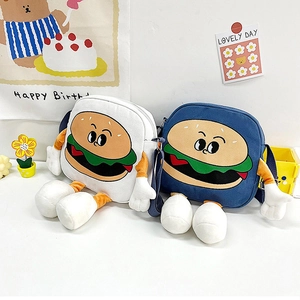 Detail of cartoon hamburger crossbody canvas bags with plush 3D hands and feet