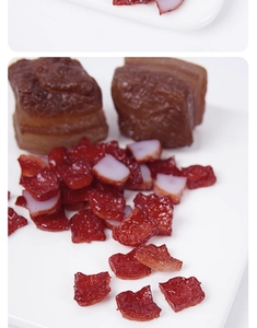 Macro detail of realistic miniature PVC smoked meat slices and cubes for dollhouse food