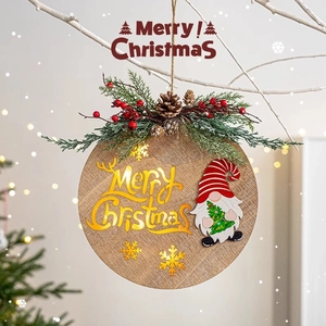Round Christmas gnome hanging sign with festive pine needles and gold Merry Christmas text