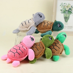 Cartoon sea turtle plush keychains in grey, pink, and green colors for bag accessories