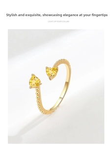 Close-up of gold-plated heart ring with yellow micro-pave zircons and bead texture